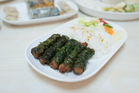 Grilled Pork In Wild Betal Leafbush Recipesの写真素材