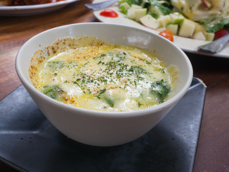 baked spinach with cheeseの写真素材