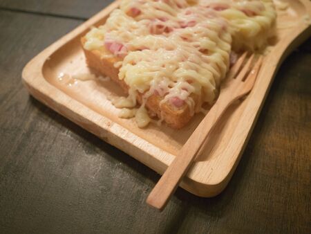 ham and cheese toast with wood trayの写真素材