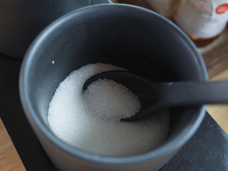 sugar in ceramic cup (high contrast)の写真素材
