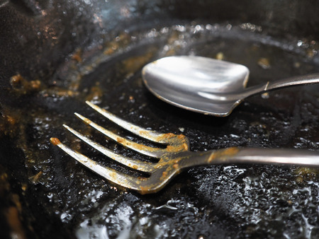used spoon and fork (focus fork)の写真素材