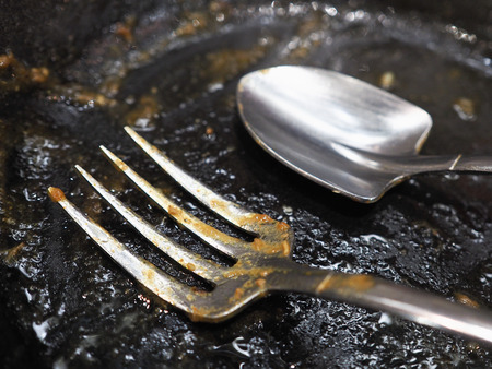 used spoon and fork (focus fork)の写真素材