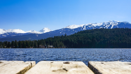 Beautiful lake and mountains with wooden. Alta Lake, Whistler, Canada.の写真素材