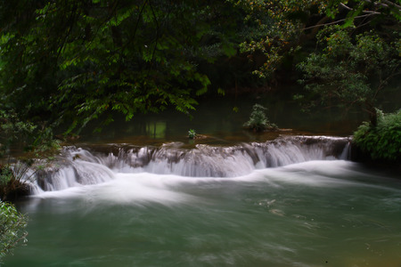 Waterfalls in the lush and beautiful forests of Thailand.の写真素材