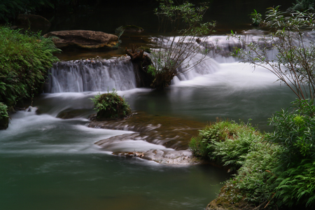 Waterfalls in the lush and beautiful forests of Thailand.の写真素材