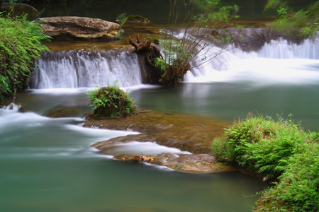 Waterfalls in the lush and beautiful forests of Thailand.の写真素材