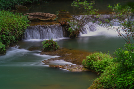 Waterfalls in the lush and beautiful forests of Thailand.の写真素材