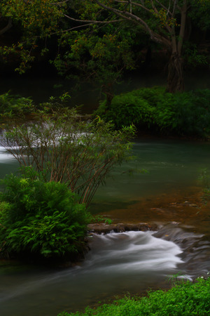 Waterfalls in the lush and beautiful forests of Thailand.の写真素材