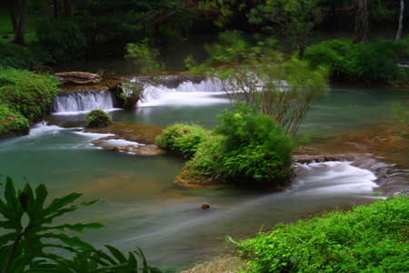 Waterfalls in the lush and beautiful forests of Thailand.の写真素材
