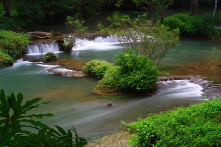 Waterfalls in the lush and beautiful forests of Thailand.の写真素材
