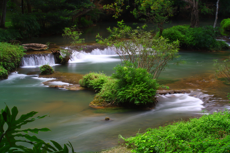 Waterfalls in the lush and beautiful forests of Thailand.の写真素材