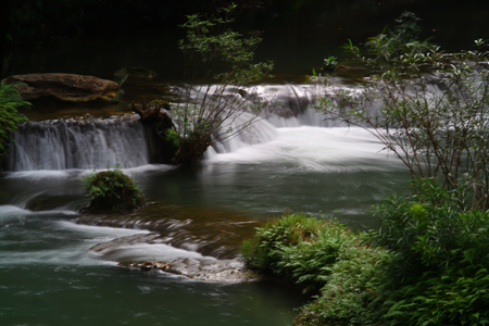 Waterfalls in the lush and beautiful forests of Thailand.の写真素材