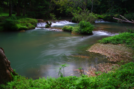 Waterfalls in the lush and beautiful forests of Thailand.の写真素材