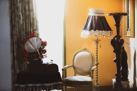 Vintage corner window decoration Complete with chairs Floor lamp And curtains and antique audio...