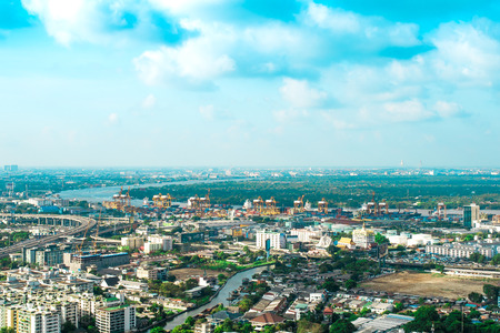 BANGKOK THAILAND - 8 March 2019 : Central of Bangkok business and industrial area The city center with a highway link, aerial views, river views in Bangkok with blue sky.のeditorial素材