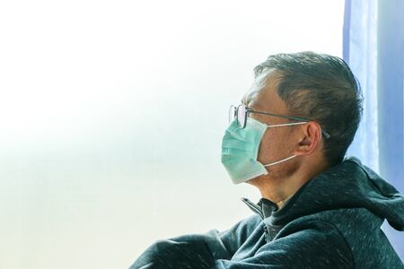 Asian men in hospitals wearing medical masksの写真素材