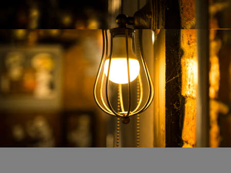 Antique electronic lamp, red wall lamp, high wall lamp, soft light.Redbrick wall. Open chain, turn...
