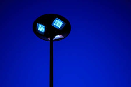 solar cell led light pole with blue sky at night. Renewable Energy concept.の写真素材