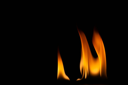 burning power of the flame, Flames, and burning sparks close-up, fire patterns, the glow of fire in...