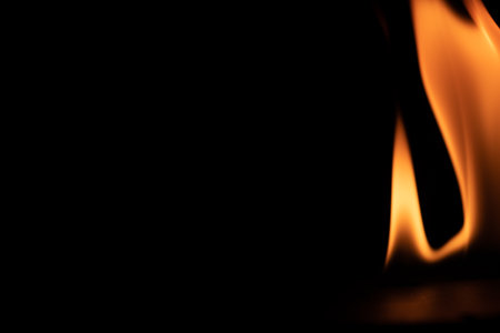 burning power of the flame, Flames, and burning sparks close-up, fire patterns, the glow of fire in...