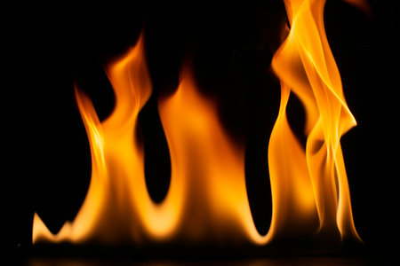 burning power of the flame, Flames, and burning sparks close-up, fire patterns, the glow of fire in...