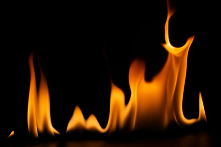 burning power of the flame, Flames, and burning sparks close-up, fire patterns, the glow of fire in...