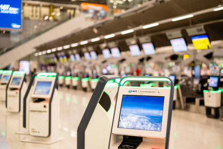 BANGKOK, THAILAND - January 21, 2023: Self-service check-in machine at Check-in counters at Suvarnabhumi International Airportのeditorial素材