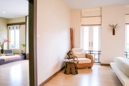 BANGKOK, THAILAND - August 31, 2006: luxury bedroom interior with natural decoration large glass window overlooking the view outside. selective focus, soft focus.のeditorial素材