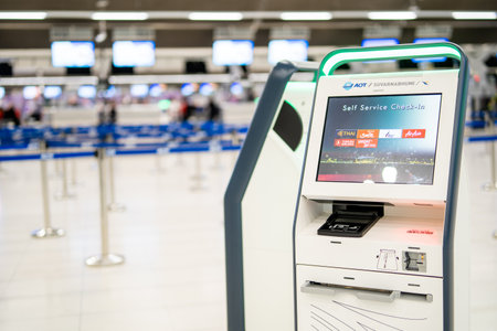 BANGKOK, THAILAND - January 21, 2023: Self-service check-in machine at Check-in counters at Suvarnabhumi International Airportのeditorial素材