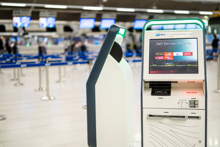 BANGKOK, THAILAND - January 21, 2023: Self-service check-in machine at Check-in counters at Suvarnabhumi International Airportのeditorial素材