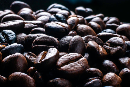 Coffee beans roasting with smoke,  selective focus, and soft focus.の写真素材