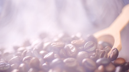 Coffee beans roasting with smoke,  selective focus, and soft focus.の写真素材