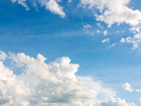 clouds and blue sunny sky,  white clouds over blue sky, Aerial view,  nature blue sky white cleat weather.の写真素材