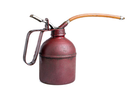 Old red oil cylinder isolated on white background. Clipping path included.の写真素材