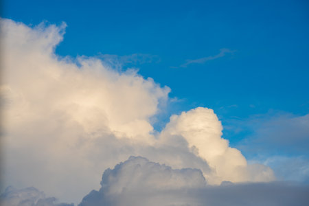 clouds and blue sunny sky,  white clouds over blue sky, Aerial view,  nature blue sky white cleat weather.の写真素材