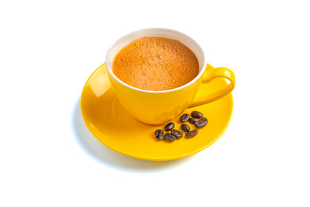 Yellow coffee cup isolated on white backgroundの写真素材