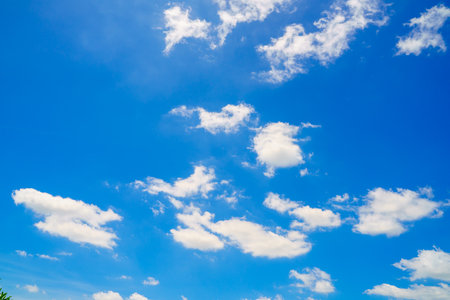 clouds and blue sunny sky,  white clouds over blue sky, Aerial view,  nature blue sky white cleat weather.の写真素材