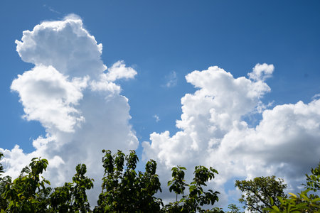clouds and blue sunny sky,  white clouds over blue sky, Aerial view,  nature blue sky white cleat weather.の写真素材