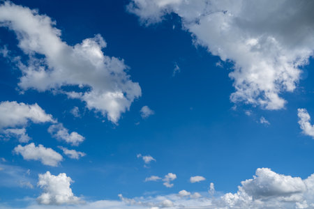 clouds and blue sunny sky,  white clouds over blue sky, Aerial view,  nature blue sky white cleat weather.の写真素材