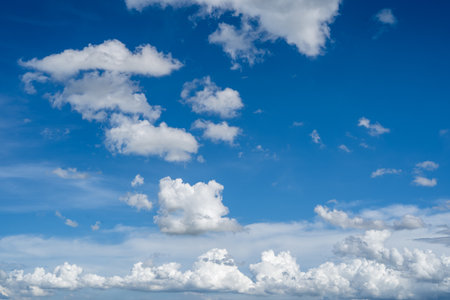 clouds and blue sunny sky,  white clouds over blue sky, Aerial view,  nature blue sky white cleat weather.の写真素材