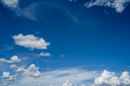 clouds and blue sunny sky,  white clouds over blue sky, Aerial view,  nature blue sky white cleat weather.の写真素材