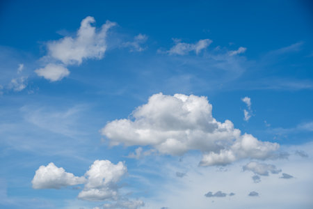 clouds and blue sunny sky,  white clouds over blue sky, Aerial view,  nature blue sky white cleat weather.の写真素材