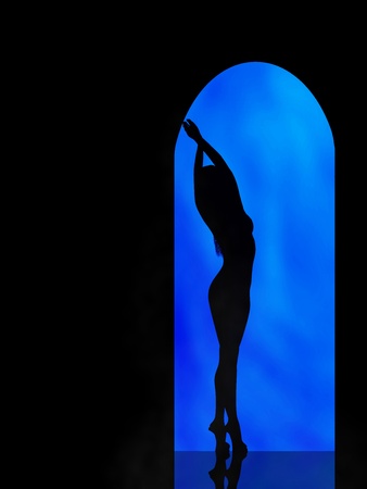 Silhouette of the girl on blue background in the archの写真素材