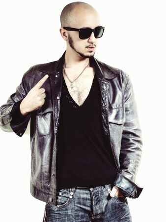 man in a gray leather jacket and glasses on white backgroundの写真素材