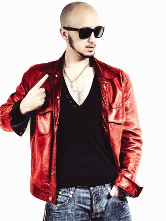 man in a red leather jacket and glasses on white backgroundの写真素材