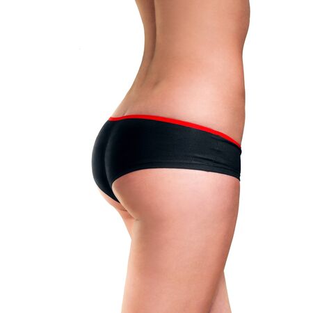 female bum in sports shorts on white backgroundの写真素材