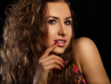 sweet young woman on black backgroundの写真素材