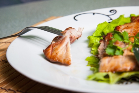 plate with grilled meat on the grey tableの写真素材