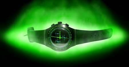 wristwatch with green lights in studioの写真素材