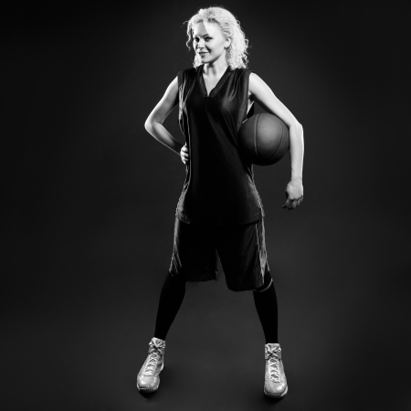 Black and white phoro of female basketballerの写真素材